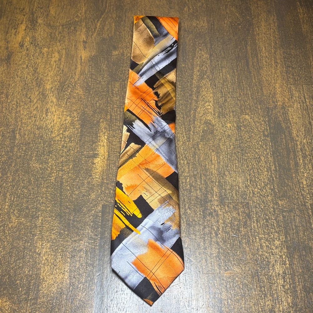 💰💰 3/$10
Jerry Garcia Orange Horizon Tie